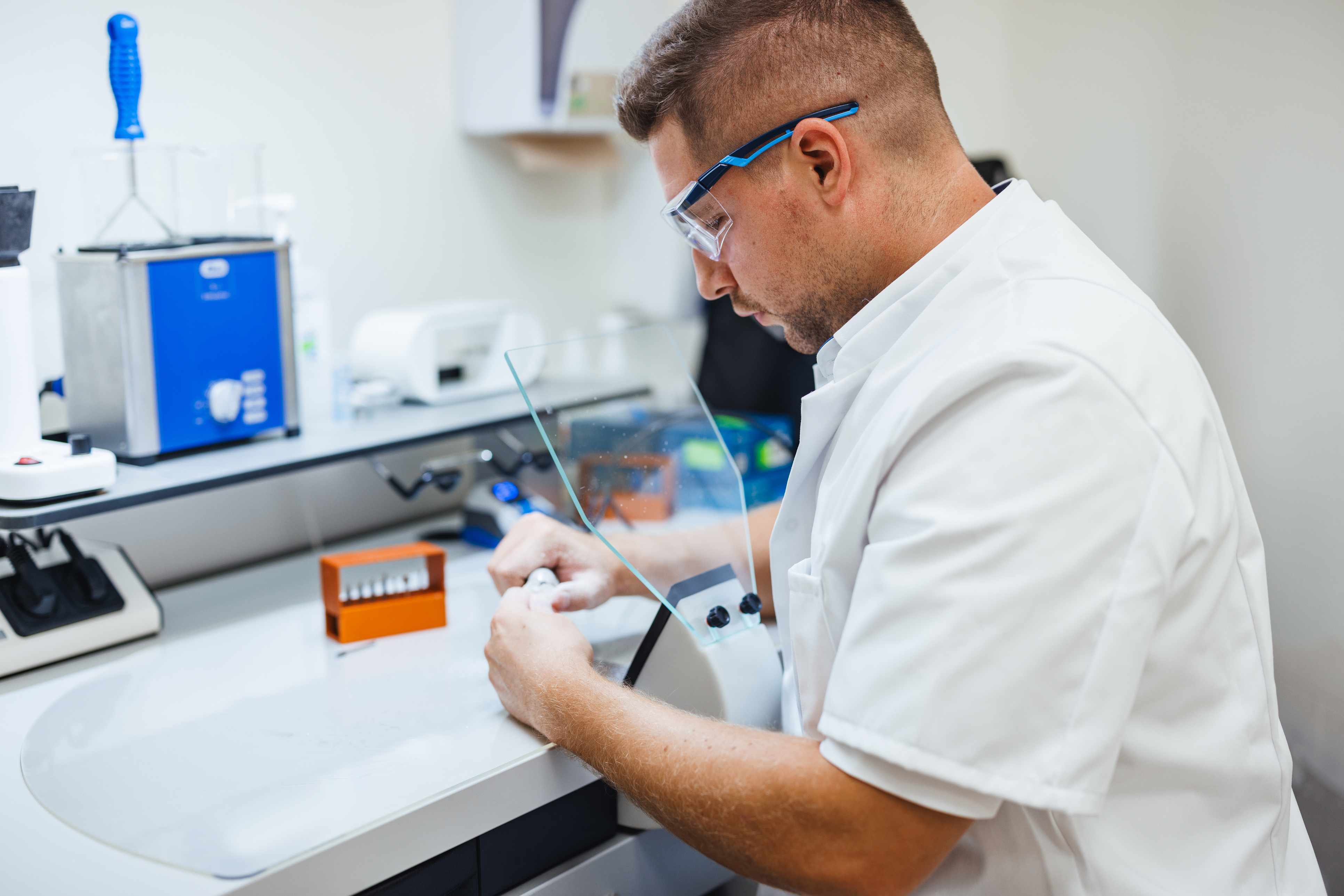 caucasian-specialist-creating-custom-in-ear-hearing-device